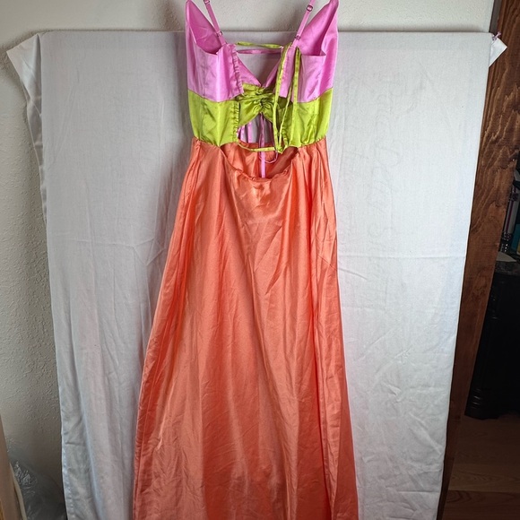 Show Me Your Mumu Calloway
Cut Out Dres in
Cantaloupe Luxe Satin - Picture 3 of 5